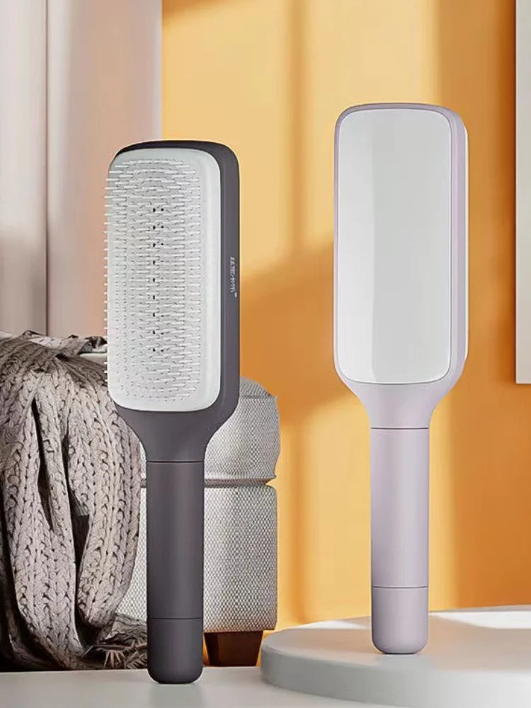 Brosse à cheveux auto-nettoyante